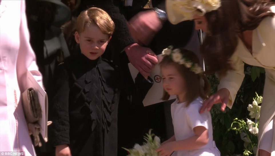 4C6DE7D000000578-5747917-George_looked_less_than_cheerful_as_he_looked_onto_the_crowds_at-a-115_1526738984134