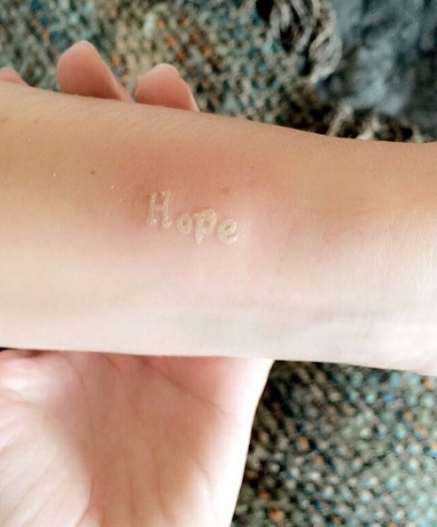 small-white-ink-tattoo